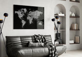 World Map glass wall art styled above a desk in an office