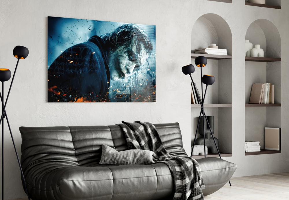 Joker glass wall art styled above a sofa in a gaming room