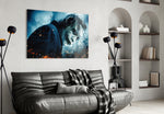 Joker glass wall art styled above a sofa in a gaming room
