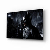 Batman glass wall art displayed above a charcoal sofa in a brick-walled home theater with reclaimed-wood console and projector screen
