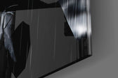 Batman artwork anchoring a wall with dark cinematic palette