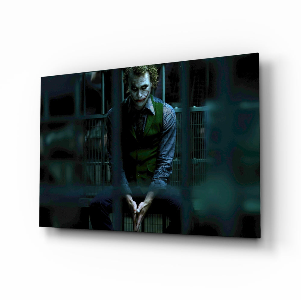 Joker Jail glass wall art displayed above a leather sofa in a slate-walled home theater with reclaimed-wood console and projector screen
