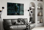Joker Jail glass wall art styled above a sofa in a gaming room