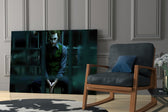 Joker Jail glass print enhancing a home theater with cinematic mood