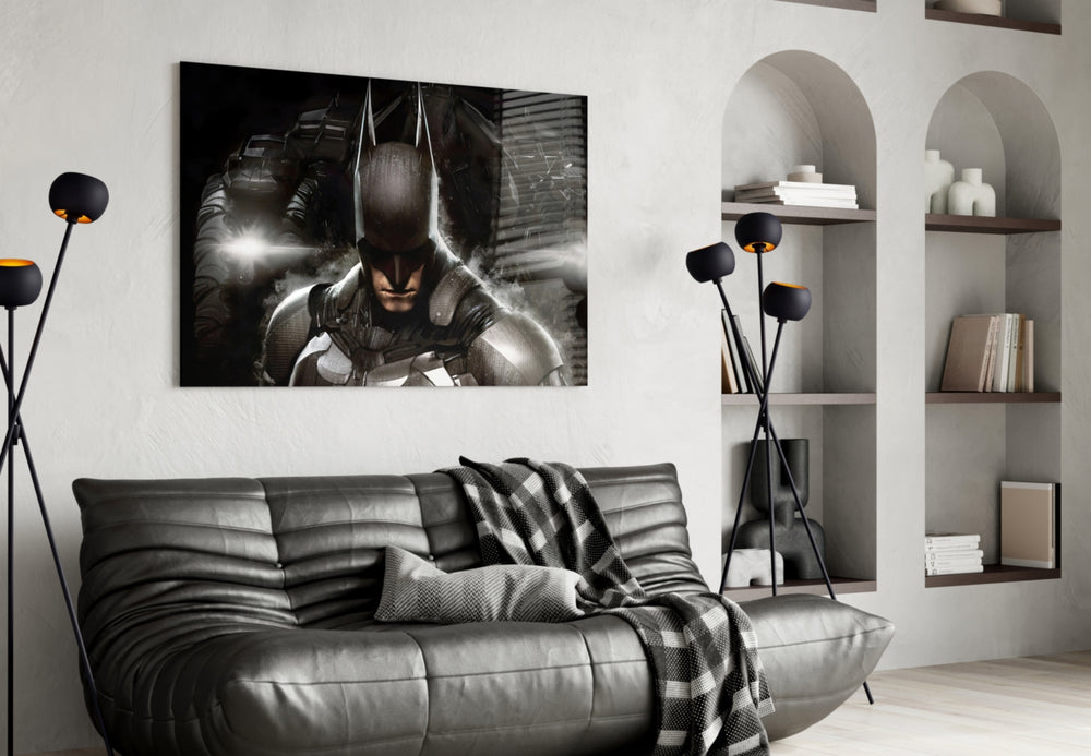 Batman glass wall art styled above a sofa in a gaming room