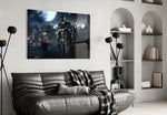 Batman glass wall art styled above a sofa in a gaming room