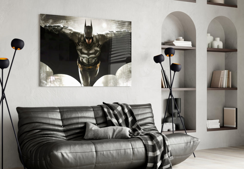 Batman glass wall art styled above a sofa in a gaming room
