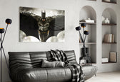 Batman glass wall art styled above a sofa in a gaming room