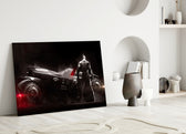 Batmobile close-up showing armored Dark Knight beside Arkham Batmobile
