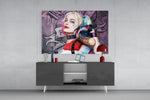 Harley Quinn panel catching screen glow to reveal its electric saturation