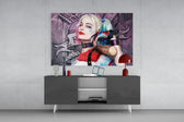 Harley Quinn panel catching screen glow to reveal its electric saturation