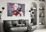 Harley Quinn glass wall art styled above a desk in an office