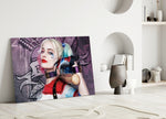 Harley Quinn close-up showing pigtailed heroine resting bat on shoulders