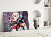 Harley Quinn close-up showing pigtailed heroine resting bat on shoulders