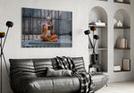 Harley Quinn glass wall art styled above a sofa in a gaming room