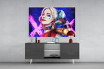Harley Quinn panel catching screen glow to reveal its electric saturation
