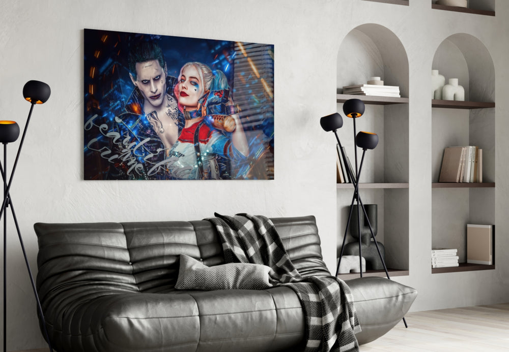 Harley Quinn and the Joker glass wall art styled above a sofa in a man cave
