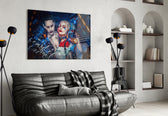 Harley Quinn and the Joker glass wall art styled above a sofa in a man cave