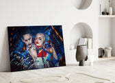 Harley Quinn and the Joker close-up showing Joker leaning against pigtailed Harley in neon city