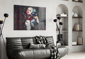 Harley Quinn glass wall art styled above a desk in an office