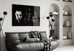 Batman Joker Harvey glass wall art styled above a sofa in a gaming room
