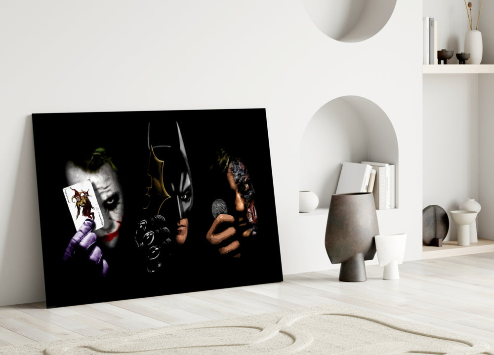 Batman Joker Harvey close-up showing three masked figures with card bat and coin