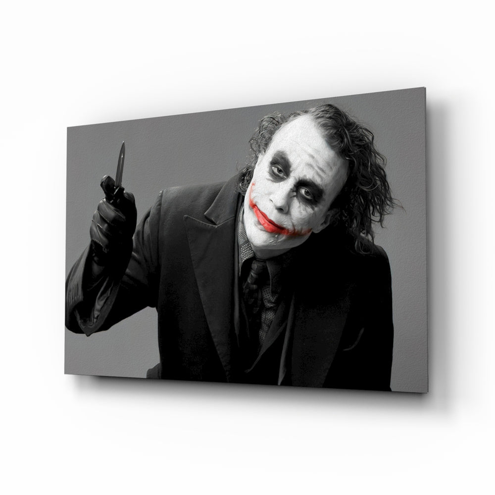Joker glass wall art displayed above a leather chesterfield in a brick-walled home theater with reclaimed-wood console and projector screen