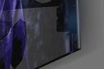 Joker artwork anchoring a wall with dark cinematic palette