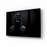 Hush and Sight glass wall art displayed above a black gaming sofa in a slate-walled lounge with neon arcade sign and matte-black coffee table