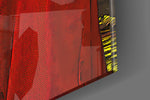 Squid Game artwork anchoring a wall with bold cinematic palette
