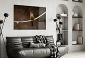 Bee Eater glass wall art styled above a bed in a bedroom