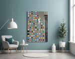 Dots glass wall art styled above a desk in a kids room