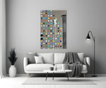 Dots close-up showing stenciled painter on tall ladder filling polka-dot wall