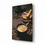 Cinnamon Coffee glass wall art displayed above a walnut buffet in a sunlit dining room with cane chairs and brass pendant lamp