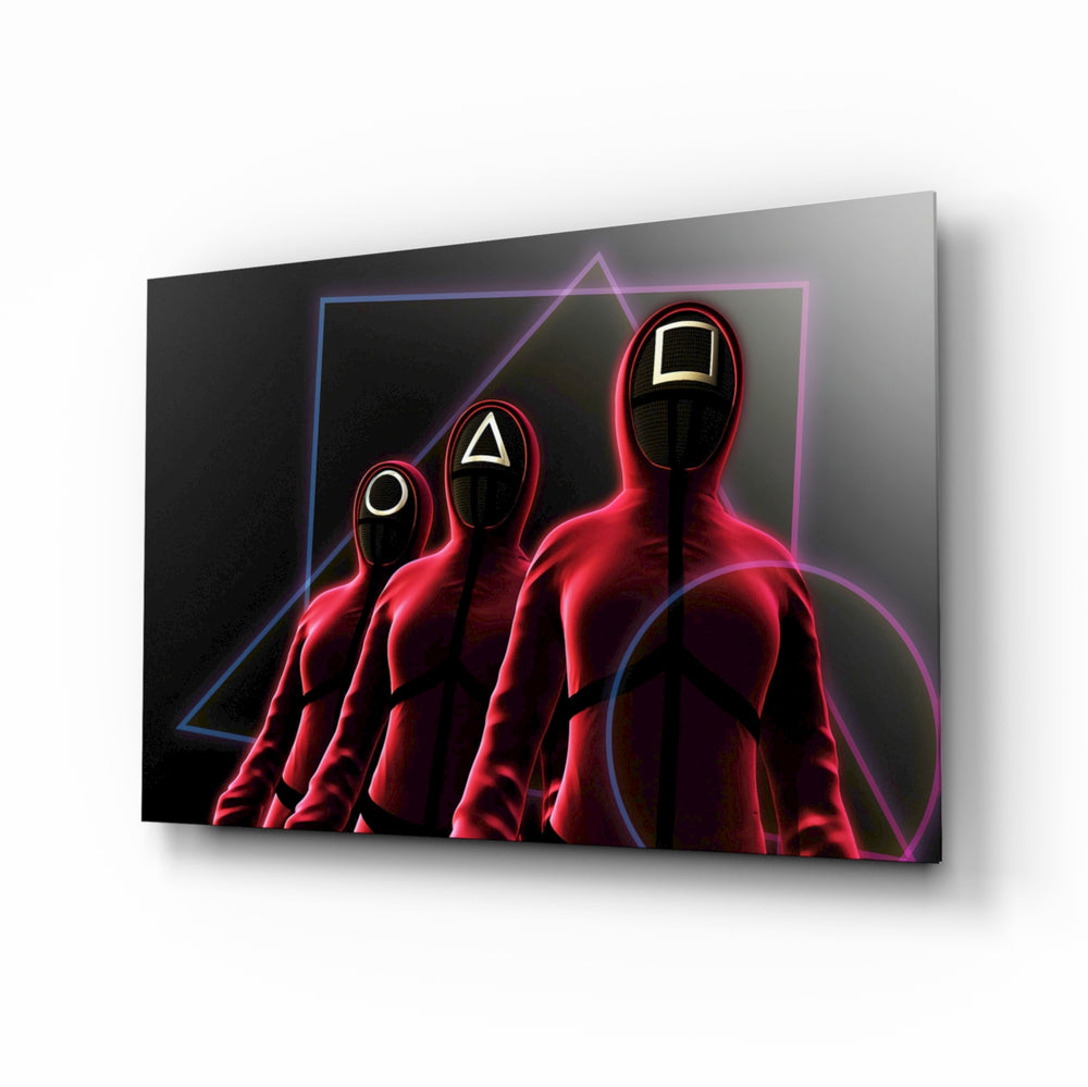 Squid Game glass wall art displayed above a black gaming sofa in a brick-walled lounge with neon arcade sign and matte-black coffee table