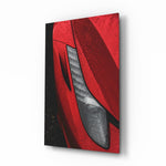 Ferraris Red glass wall art displayed beside a leather chesterfield in a slate-walled man cave with reclaimed-wood console and matte-black floor lamp