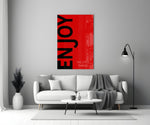 Enjoy The Little Things close-up showing onyx ENJOY type on crimson field with pale tagline