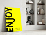Enjoy The Little Things glass print enhancing a hallway with cinematic warmth