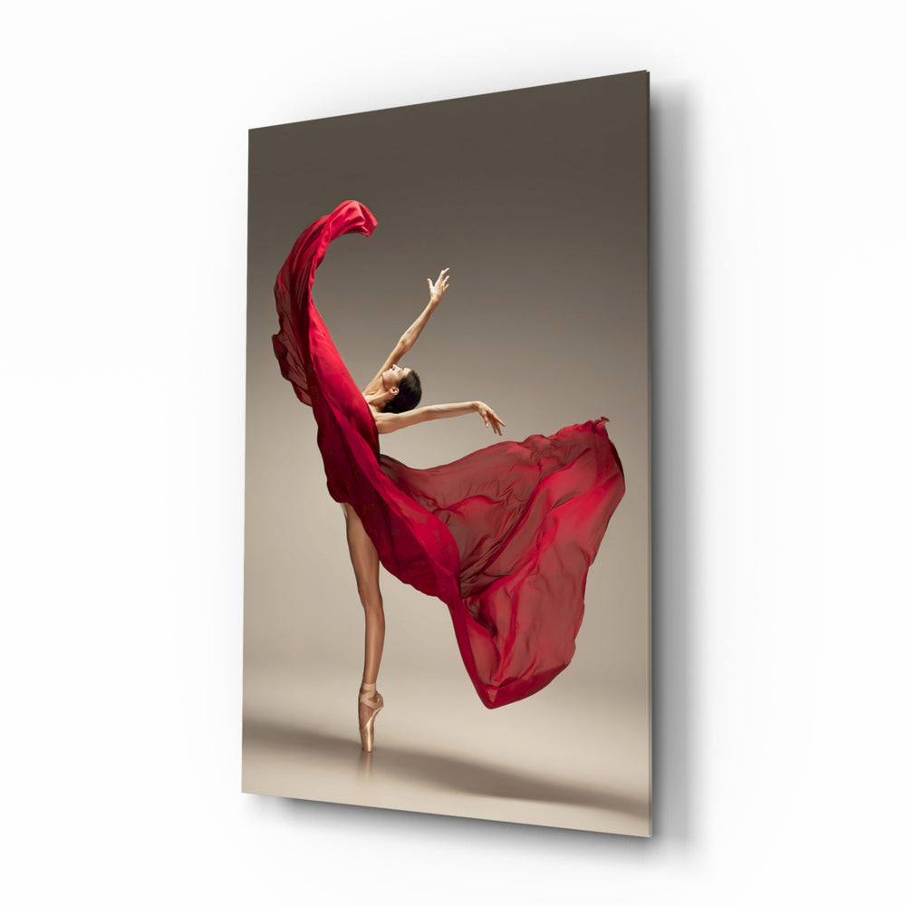 Ballerina glass wall art displayed above a charcoal velvet bed in a fawn bedroom with brushed-brass sconces and crimson velvet bench