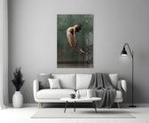 Ballerina close-up showing dancer mid-leap with hair fanned and head thrown back