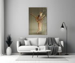 Ballerina close-up showing high arabesque with cream chiffon trailing from wrist