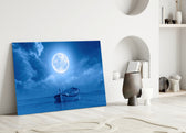 Moon and Boat close-up showing wooden boat under glowing full moon and azure clouds