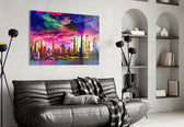 Colorful Silhouette of the City glass wall art styled above a sofa in a living room