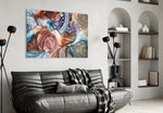 Marble glass wall art styled above a bed in a bedroom