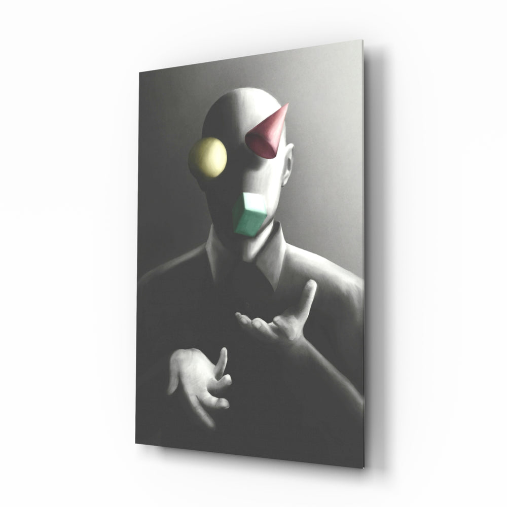 Juggler glass wall art displayed above a charcoal sofa in a slate-walled office lounge with steel desk and matte-black shelving