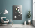 Juggler glass wall art styled above a desk in an office