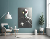 Juggler glass wall art styled above a desk in an office