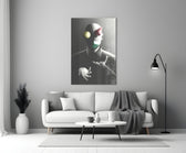 Juggler close-up showing bald figure with floating sphere cone and cube
