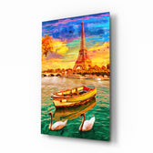 Eiffel and Boat glass wall art displayed above a walnut sideboard in a sunlit dining room with cane chairs and brass pendant lamp
