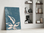 Leaves glass print enhancing a living room with cinematic warmth